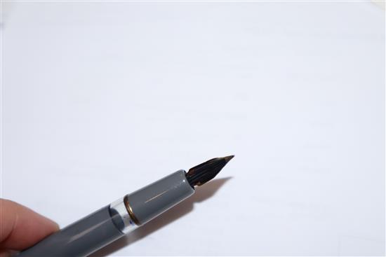 A Mont Blanc 252 grey finish fountain pen and propelling pencil set, cased and a Caran DAche silver ballpoint pen